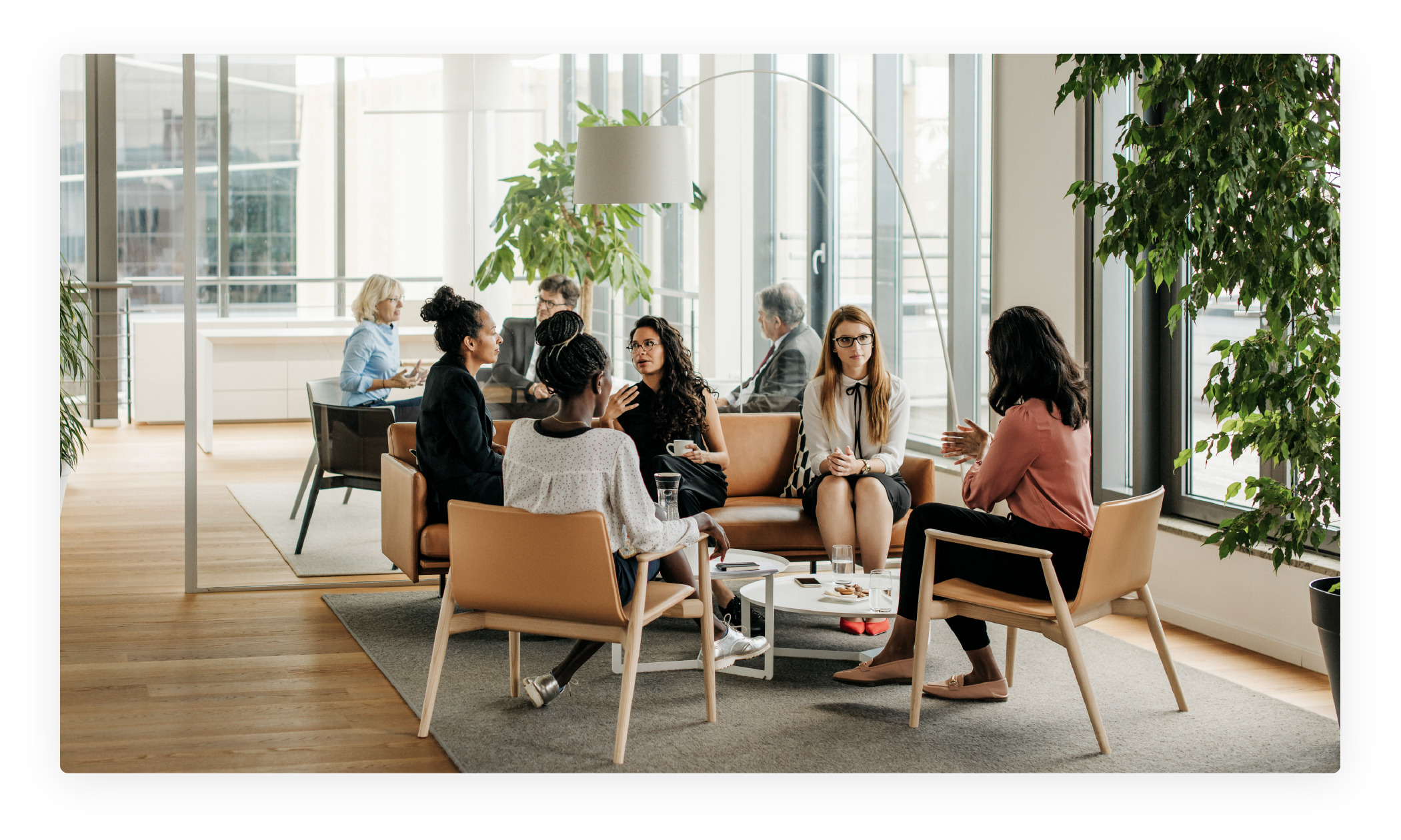 Group of employees sitting and talking